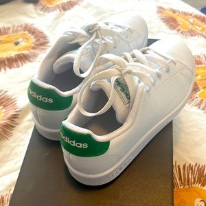 Like new little boys all white adidas w/ green on back. Only worn 4 times Size 1